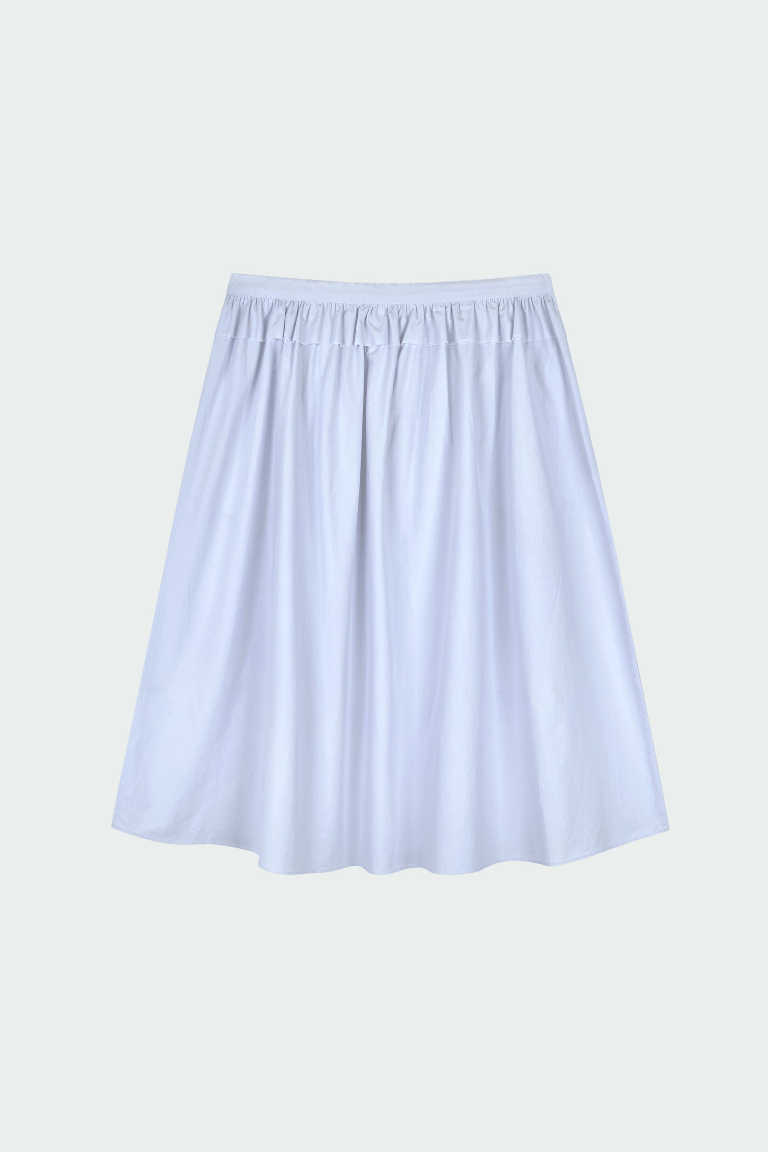 Maryam Skirt in sky, a midi cotton skirt with shirred waistband, drawstring detail, side pockets, and a softly flared silhouette