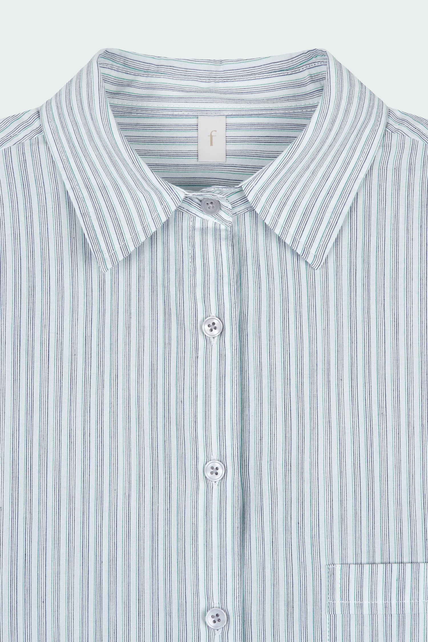 Cara Dress in stripe, long sleeve cotton shirt dress with front chest pocket, curved hem, hidden side pockets, and a relaxed silhouette.