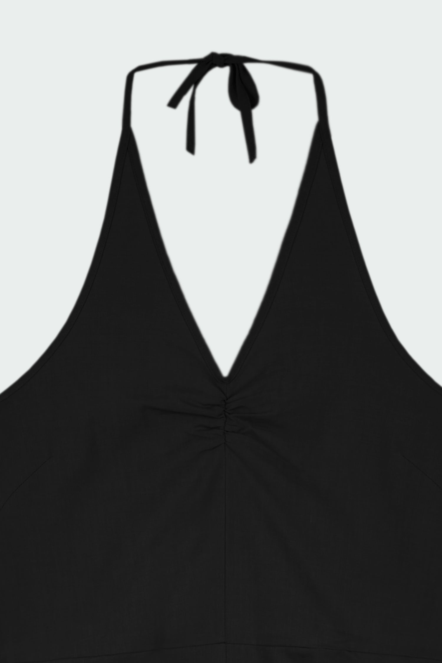 Daisy Jumpsuit in black, sleeveless linen blend jumpsuit with adjustable halterneck, open back, straight-leg silhouette, and relaxed fit.