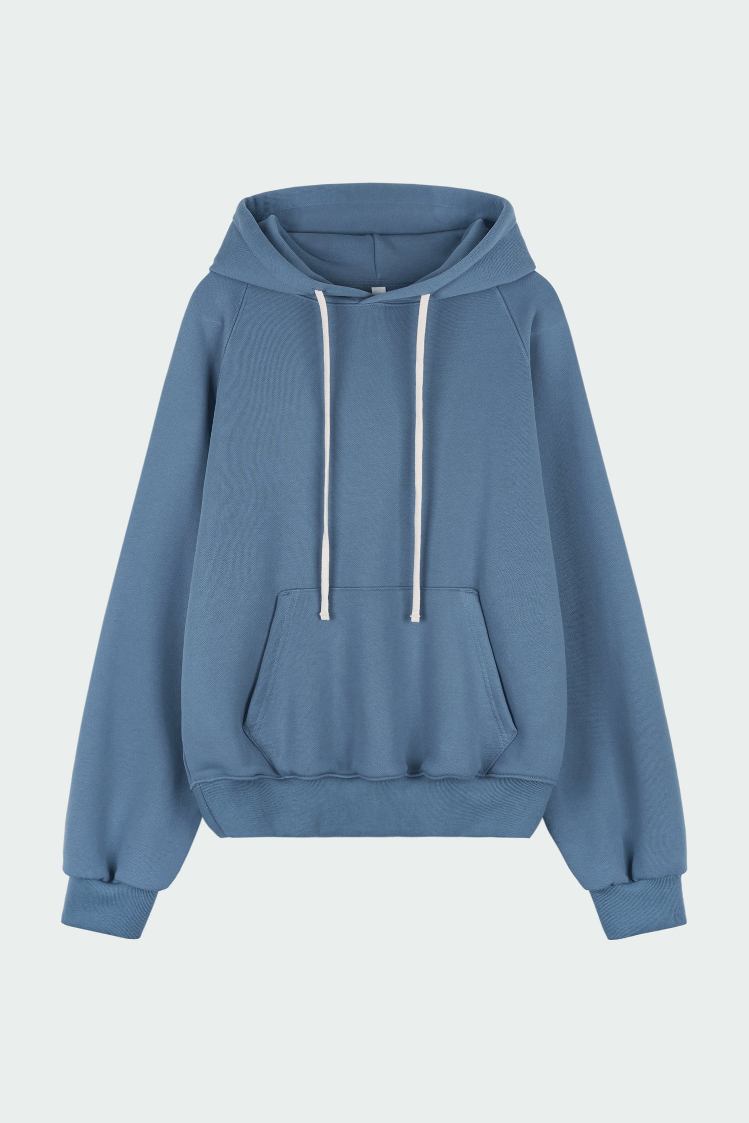 Kaia Hoodie in indigo blue, oversized cotton French terry pullover with drawstring hood, raglan sleeves, kangaroo pocket, and ribbed trims.