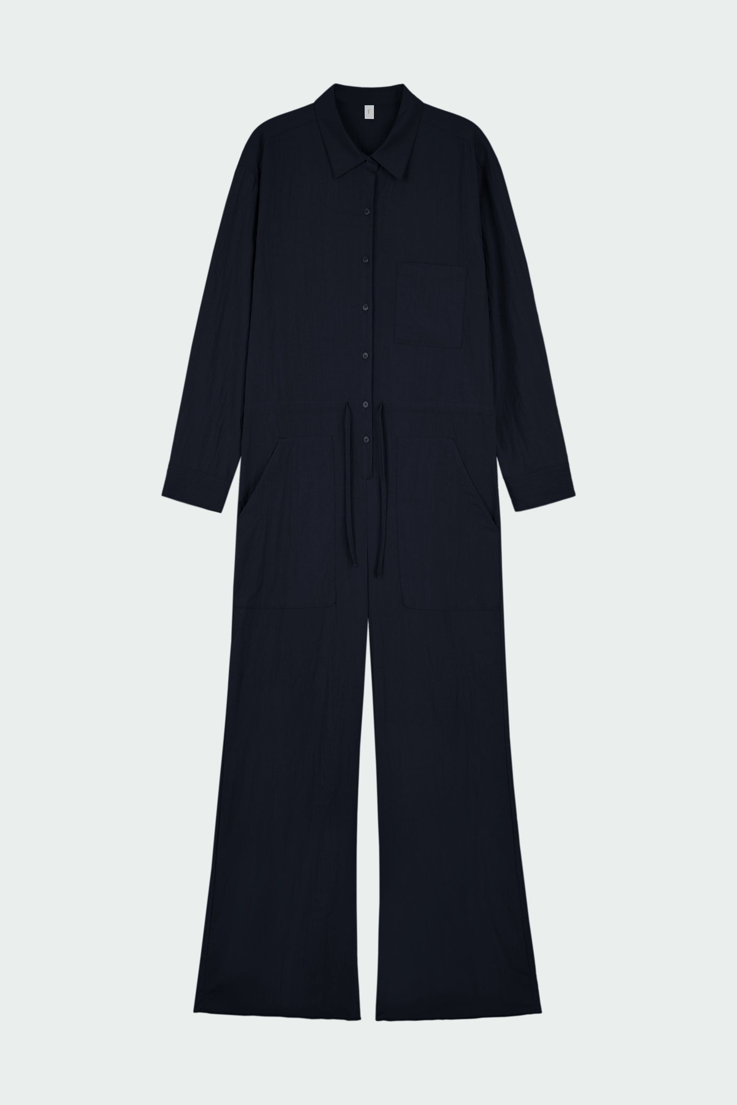 Saige Jumpsuit in navy, long-sleeve rayon blend jumpsuit with point collar, front button closure, drawstring waist, and patch pockets
