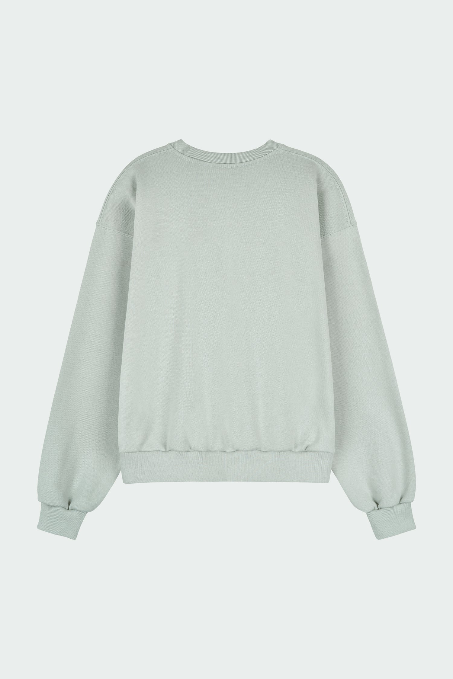 Willow Sweatshirt in pistachio, a soft cotton French terry pullover with a crew neck, V-stitch detail, ribbed trims, and a relaxed fit, designed for everyday comfort