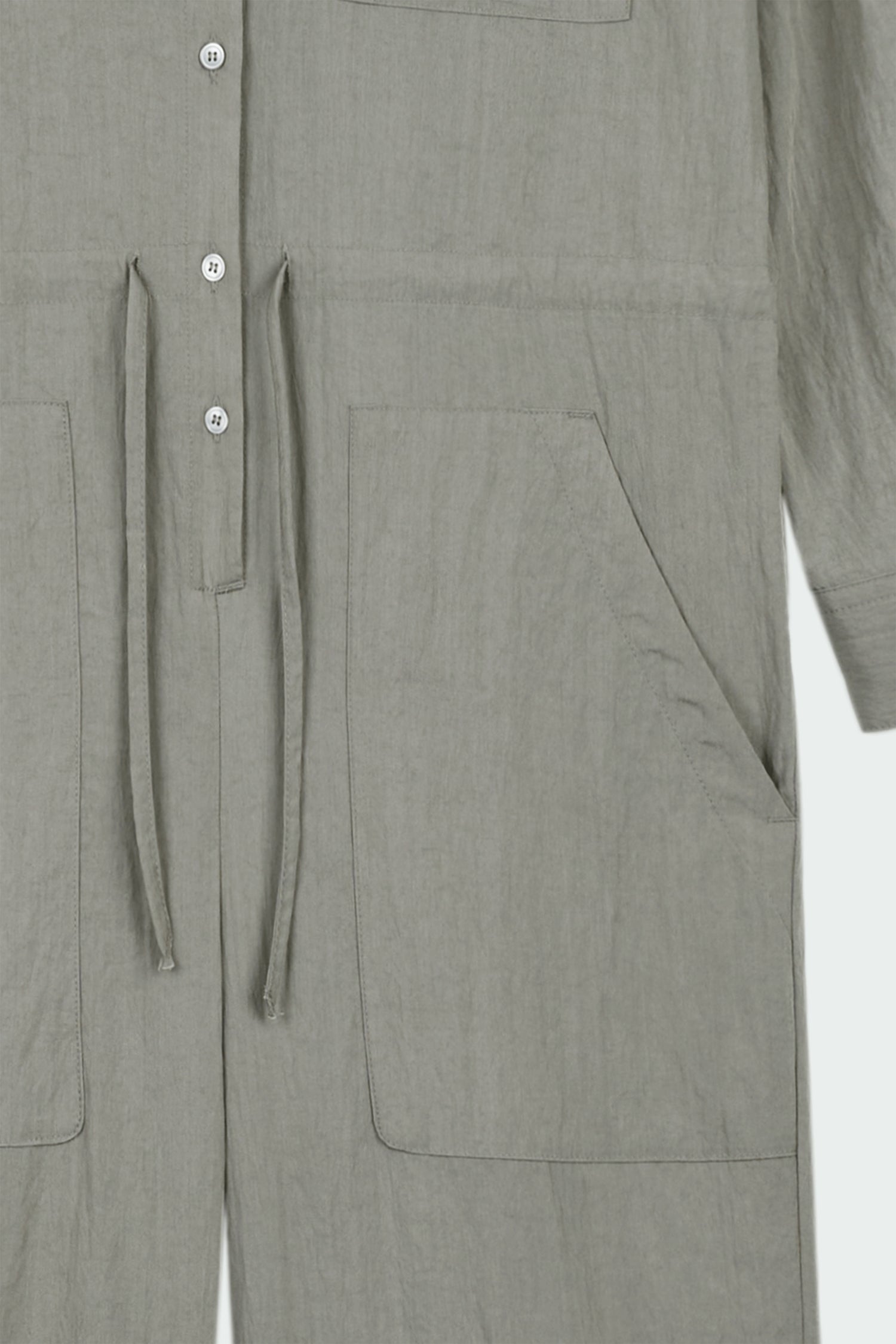 Saige Jumpsuit in khaki gray, long-sleeve rayon blend jumpsuit with point collar, front button closure, drawstring waist, and patch pockets.