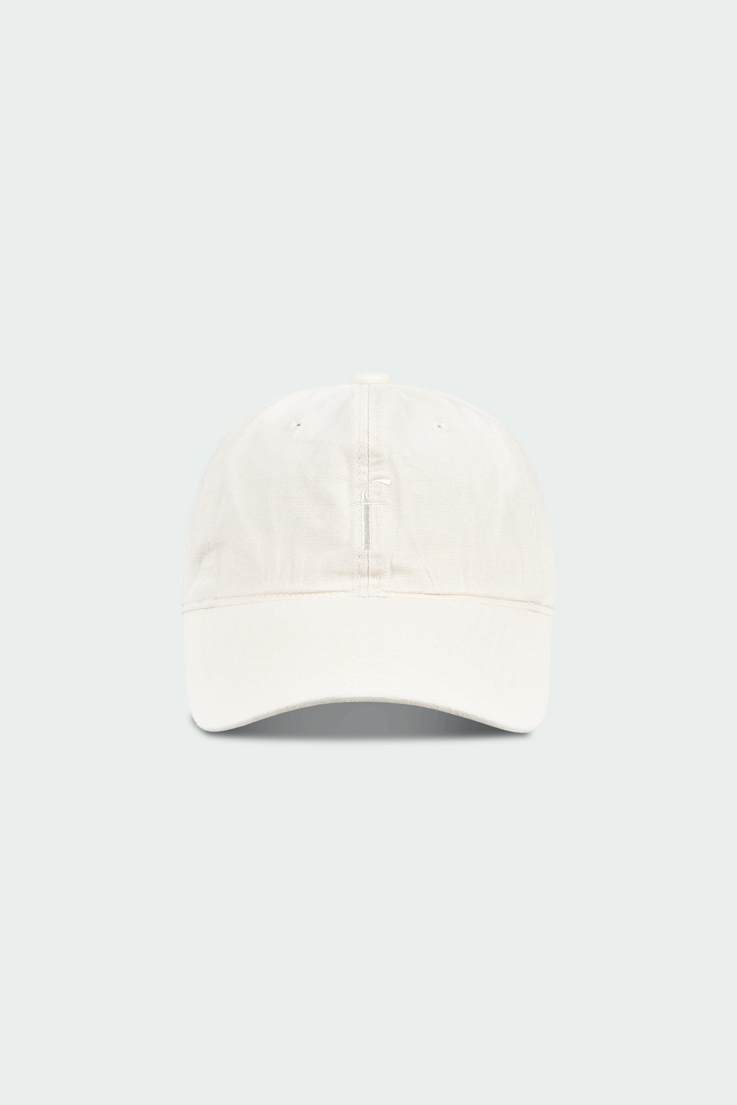 Steva Oxford Cap in cream, made from soft washed cotton with a front embroidered logo and adjustable buckle strap, designed for a casual everyday look