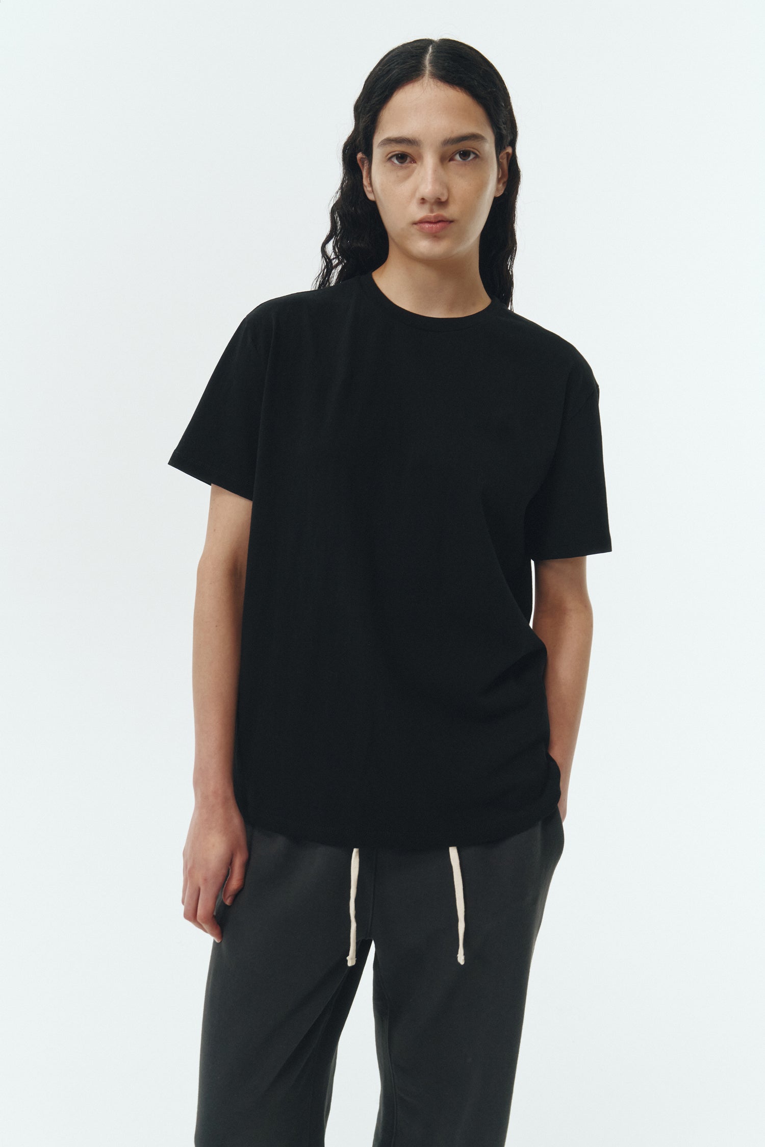 Lara T-shirt in black, a relaxed-fit lightweight cotton tee with a crew neck and short sleeves for breathable daily wear.