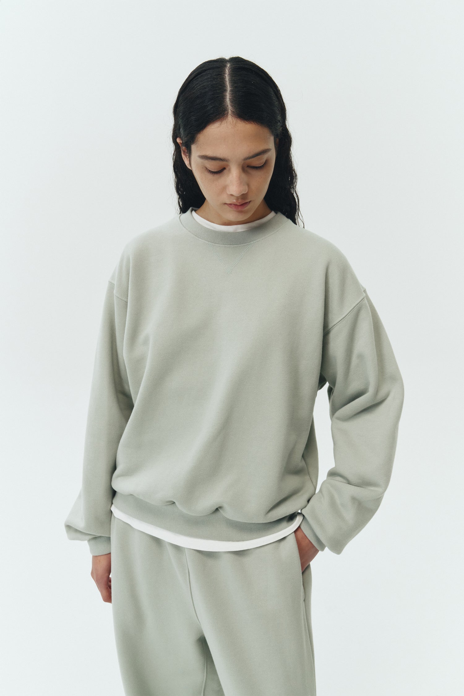 Willow Sweatshirt in pistachio, a soft cotton French terry pullover with a crew neck, V-stitch detail, ribbed trims, and a relaxed fit, designed for everyday comfort