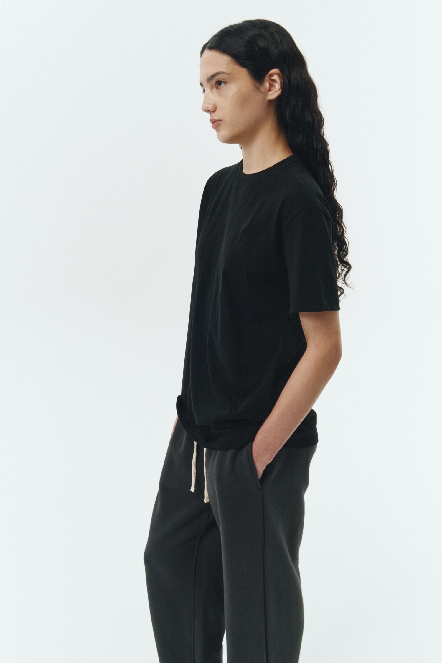 Lara T-shirt in black, a relaxed-fit lightweight cotton tee with a crew neck and short sleeves for breathable daily wear.