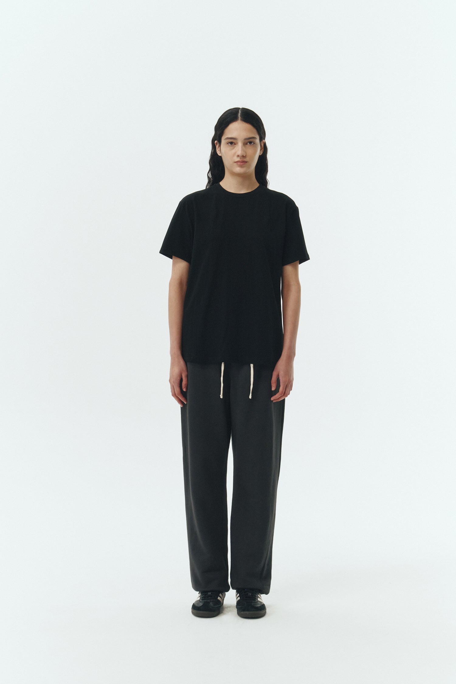 Lara T-shirt in black, a relaxed-fit lightweight cotton tee with a crew neck and short sleeves for breathable daily wear.