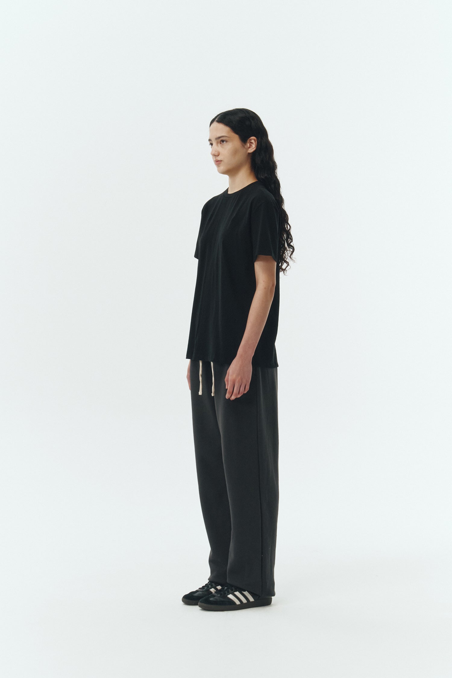Lara T-shirt in black, a relaxed-fit lightweight cotton tee with a crew neck and short sleeves for breathable daily wear.