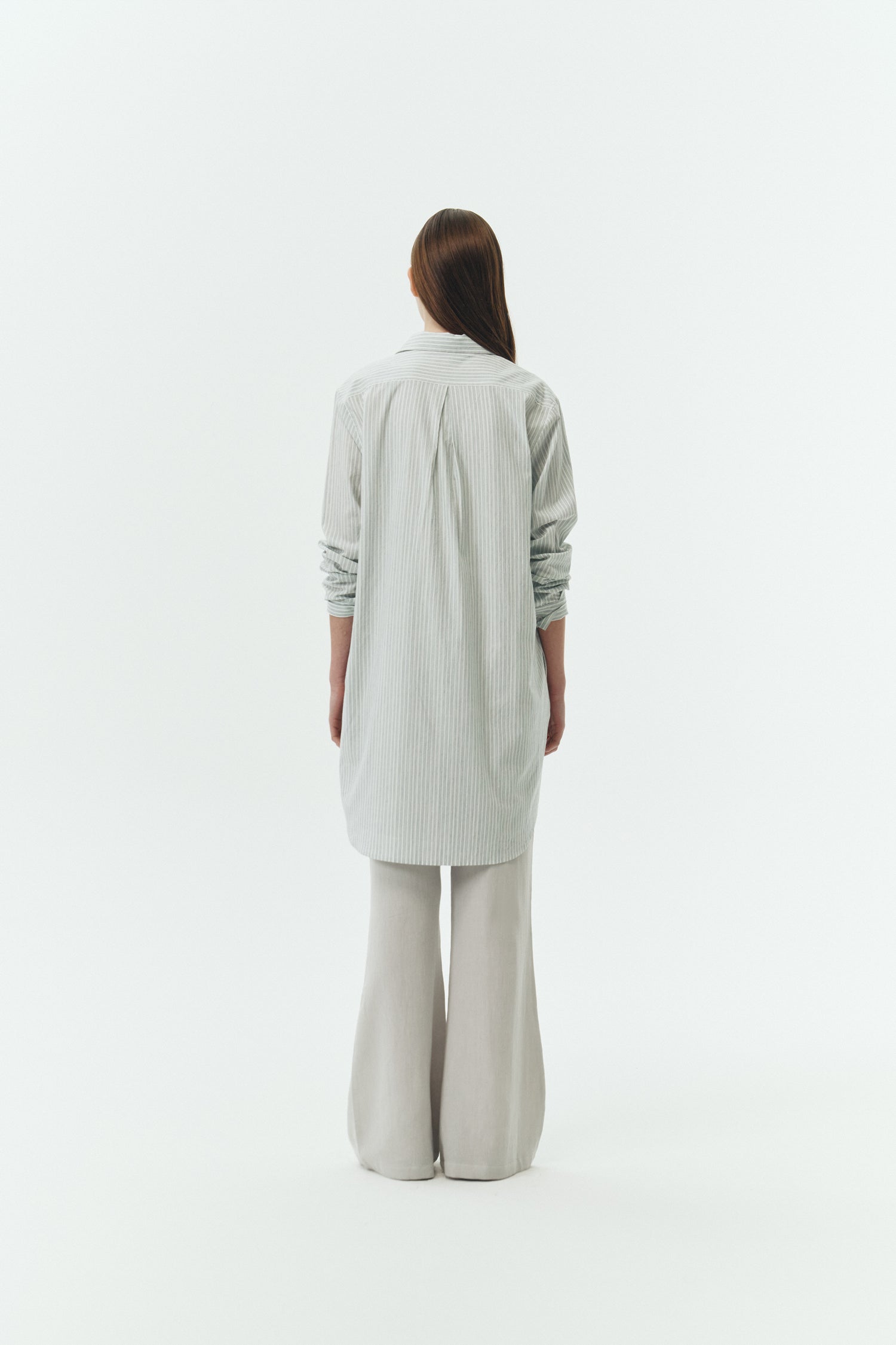 Cara Dress in stripe, long sleeve cotton shirt dress with front chest pocket, curved hem, hidden side pockets, and a relaxed silhouette.