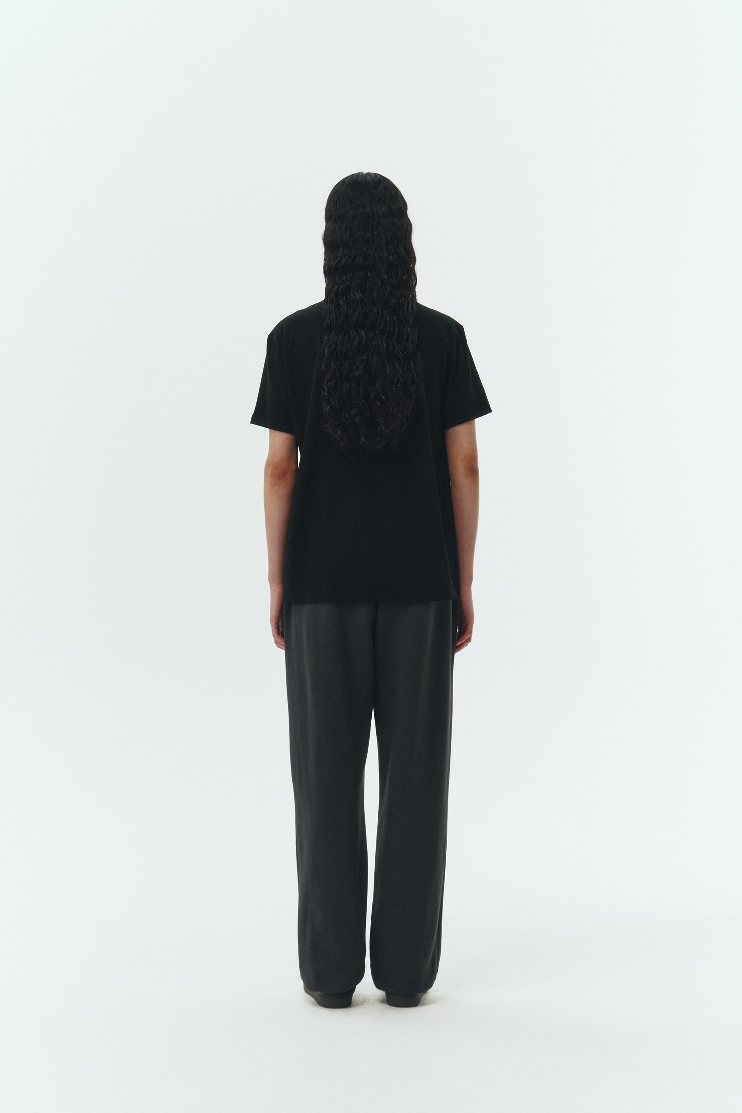 Lara T-shirt in black, a relaxed-fit lightweight cotton tee with a crew neck and short sleeves for breathable daily wear.