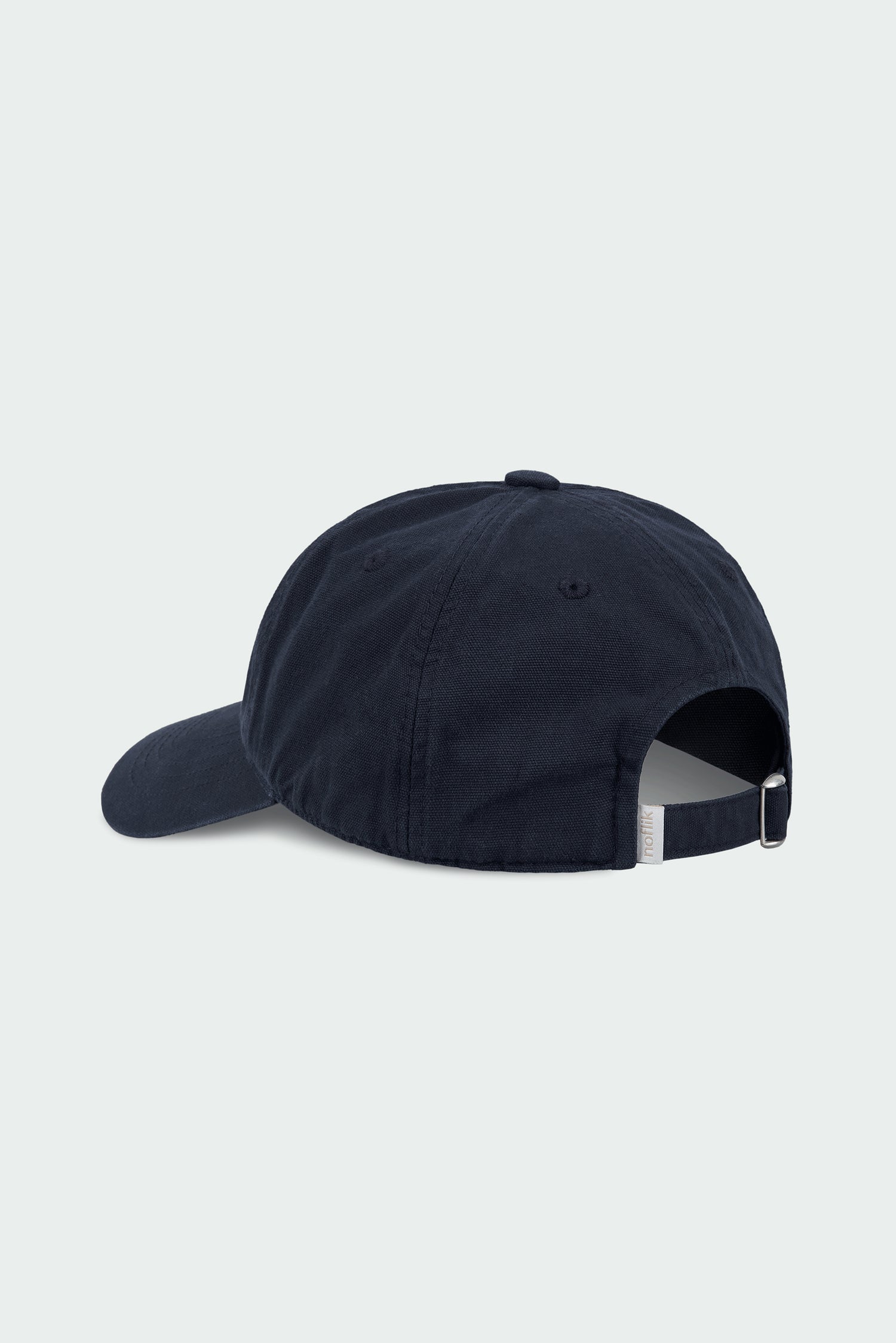 Steva Oxford Cap in navy, made from soft washed cotton with a front embroidered logo and adjustable buckle strap, designed for a casual everyday look