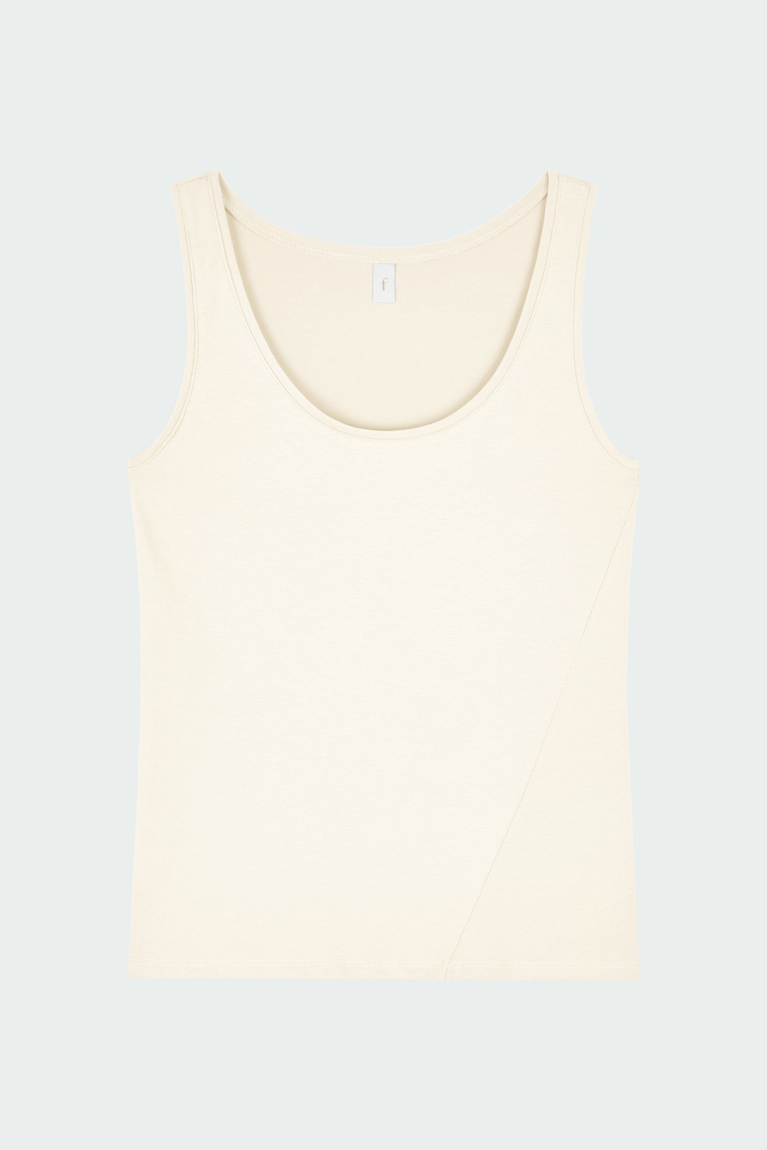 Zoe Tank Top in cream, slim-fit stretch cotton tank with scooped neckline and diagonal seam detail for a sleek and minimal silhouette.