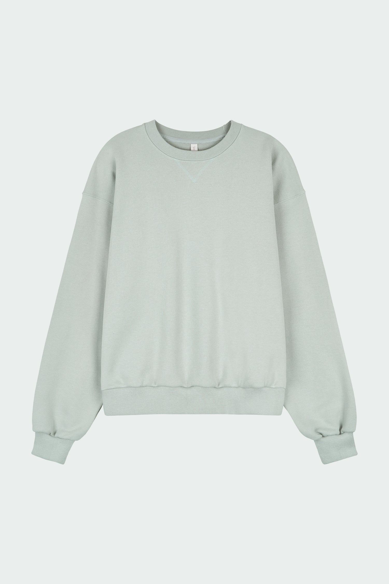 Willow Sweatshirt in pistachio, a soft cotton French terry pullover with a crew neck, V-stitch detail, ribbed trims, and a relaxed fit, designed for everyday comfort
