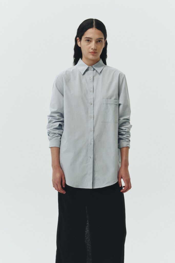 Isabella Shirt in sky, a lightweight cotton-poly blend button-up with chest pocket, back pleat, and buttoned cuffs, designed in a regular fit with a hip-length silhouette