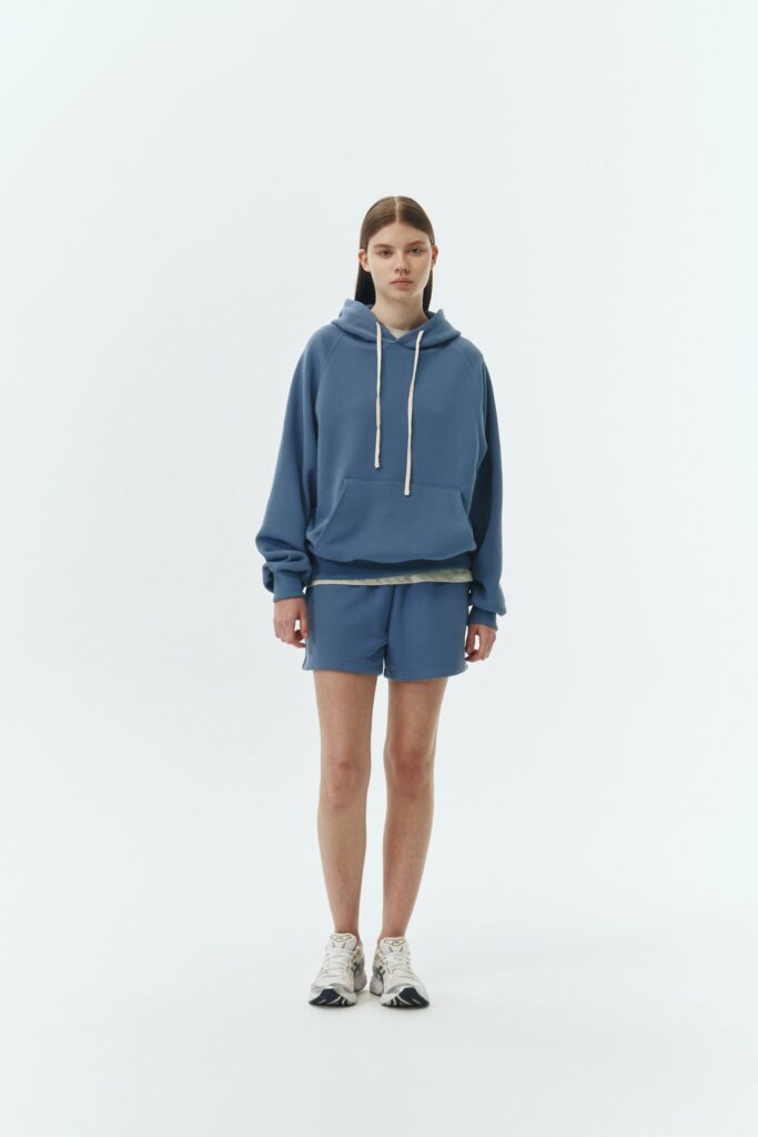 Kaia Shorts in indigo blue, mini-length cotton French terry shorts with an elasticated drawstring waist, side pockets, and back pocket, regular fit, part of a casual set