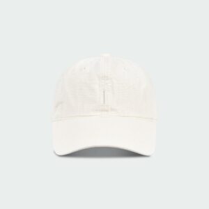 Steva Oxford Cap in cream, made from soft washed cotton with a front embroidered logo and adjustable buckle strap, designed for a casual everyday look