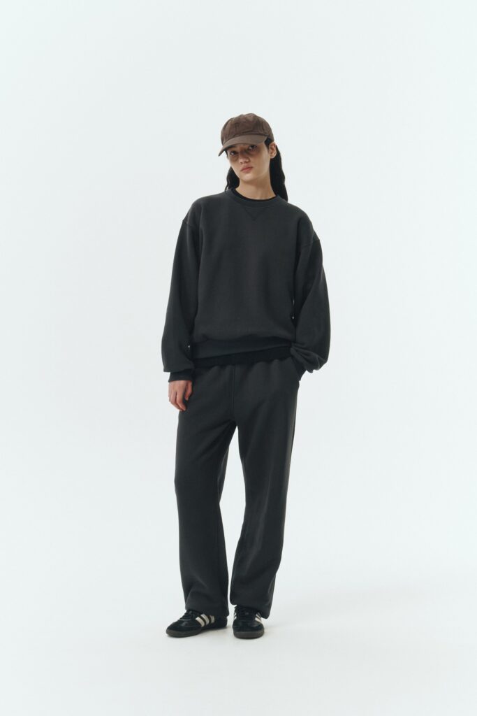 Willow Sweatpants in ink black, soft French terry cotton with drawstring waistband, side pockets, and elastic cuffs, regular fit, part of a set