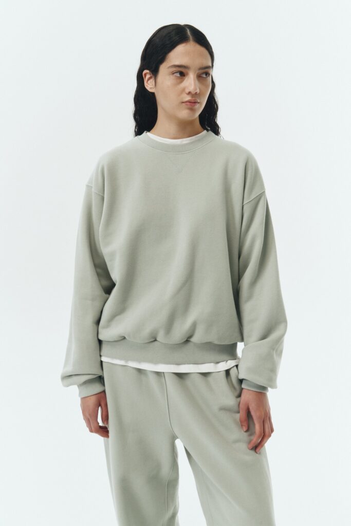 Willow Sweatshirt in pistachio, a soft cotton French terry pullover with a crew neck, V-stitch detail, ribbed trims, and a relaxed fit, designed for everyday comfort
