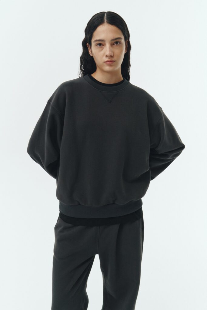 Willow Sweatshirt in ink black, a soft cotton French terry pullover with a crew neck, V-stitch detail, ribbed trims, and a relaxed fit, designed for everyday comfort